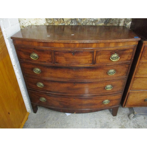 229 - A Georgian mahogany bow front chest of drawers with three short over three long drawers, raised on b... 