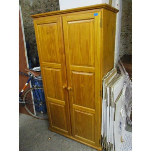 234 - A modern pine twin door wardrobe and a similar pine chest of six drawers 
Location: G