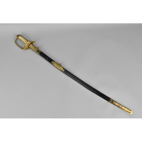 159 - A Japanese WWII Officer's sword (kyu-gunto), with white same grip and brass mounted hilt, with sakur... 