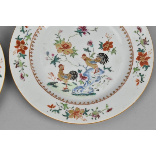 21 - Two Chinese export Famille rose porcelain plates, 18th century, the central roundel depicting two ro... 