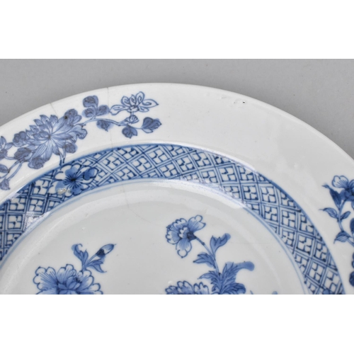 43 - An 18th century Chinese blue and white Kangxi style plate with central hunting scene and meandering ... 