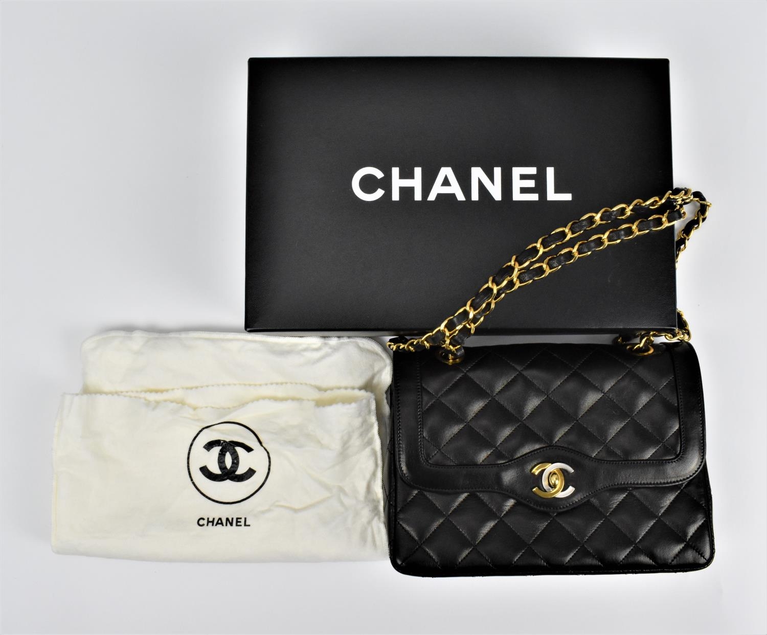 A Chanel, pre 1984, black lambskin double flap handbag with gold