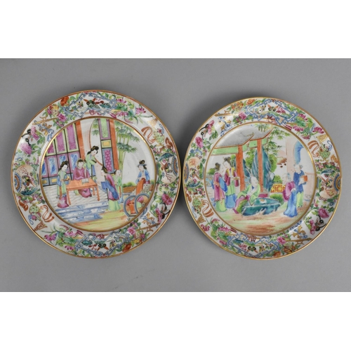 59 - A set of four 19th century Cantonese porcelain plates and two oval dishes, each decorated with a cen... 