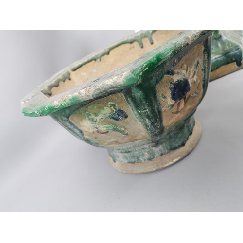 63 - A 19th century Chinese sancai glazed jardiniere on stand, the jardiniere with octagonal top above a ... 