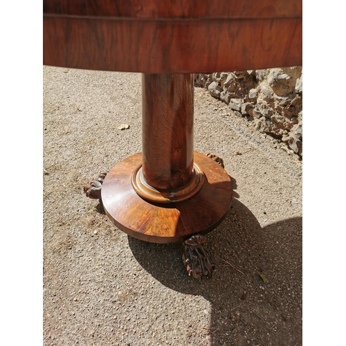 175 - A William IV rosewood occasional table, the circular top above a central column on a circular base w... 