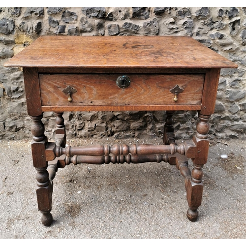 187 - A William and Mary style oak side table, of rectangular form with single drawer and acorn drop twin ... 