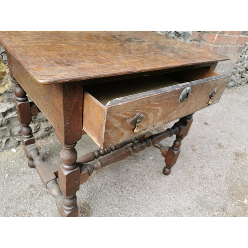 187 - A William and Mary style oak side table, of rectangular form with single drawer and acorn drop twin ... 