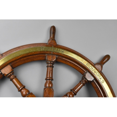 154 - A 19th century brass mounted teak ship wheel by Brown's Rosebank Ironworks, Edinburgh, 84 cm diamete... 