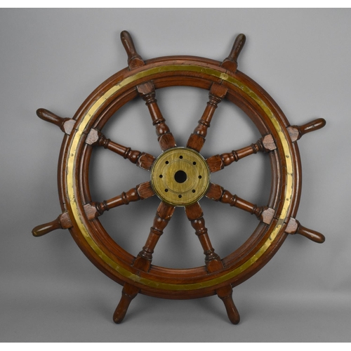 154 - A 19th century brass mounted teak ship wheel by Brown's Rosebank Ironworks, Edinburgh, 84 cm diamete... 