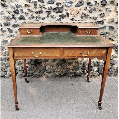 158 - An Edwardian mahogany and strung writing desk, with pierced part gallery top above a single drawer e... 