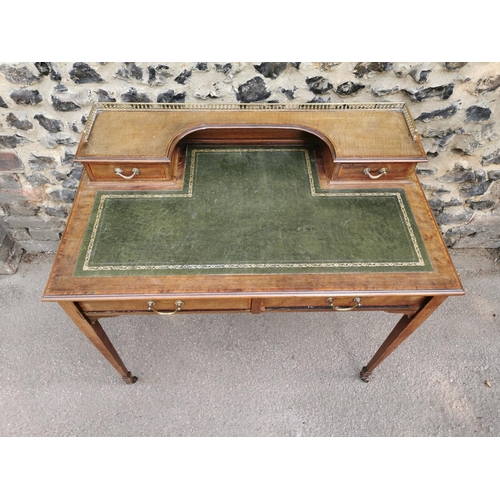 158 - An Edwardian mahogany and strung writing desk, with pierced part gallery top above a single drawer e... 