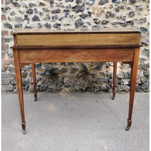 158 - An Edwardian mahogany and strung writing desk, with pierced part gallery top above a single drawer e... 