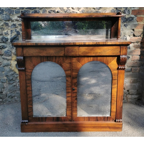 177 - A William IV rosewood chiffonier, with mirrored back , the bottom part with twin doors, each with ar... 