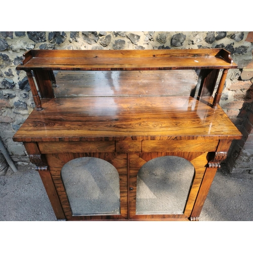 177 - A William IV rosewood chiffonier, with mirrored back , the bottom part with twin doors, each with ar... 