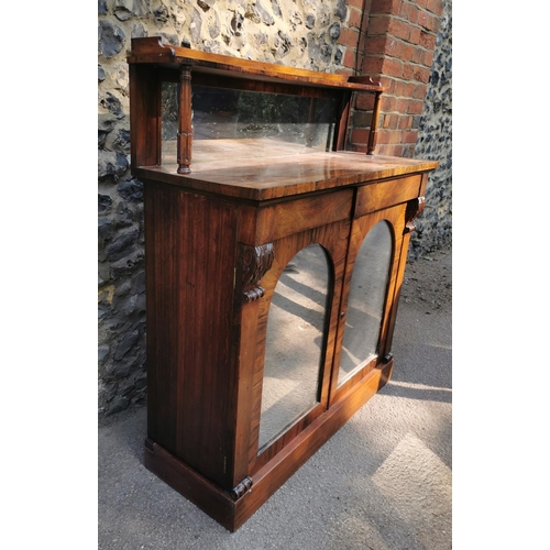 177 - A William IV rosewood chiffonier, with mirrored back , the bottom part with twin doors, each with ar... 