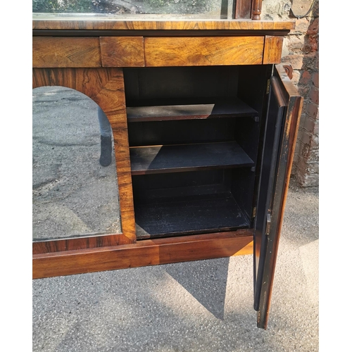 177 - A William IV rosewood chiffonier, with mirrored back , the bottom part with twin doors, each with ar... 