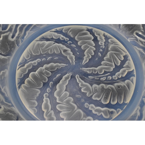 16 - A René Lalique 1920s opalescent glass 'Chiens' pattern bowl, model number 3214, with moulded leaping... 