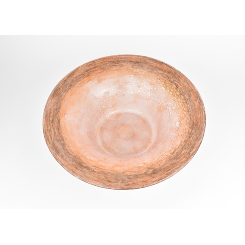 60 - A large post war studio glass UB shaped bowl, in the Monart style in mottled pink with large everted... 