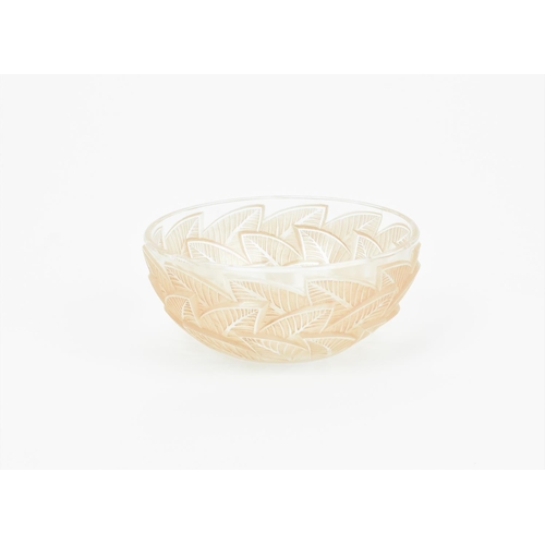 8 - A Rene Lalique frosted and clear pink tinted bowl in the 'Ormeaux' pattern, the underside stencilled... 