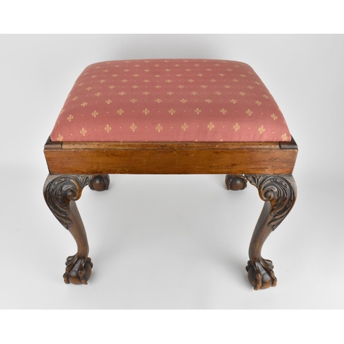 197 - A fine George II style carved walnut stool, 19th century, with drop in upholstered seat, raised on f... 