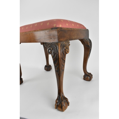 197 - A fine George II style carved walnut stool, 19th century, with drop in upholstered seat, raised on f... 