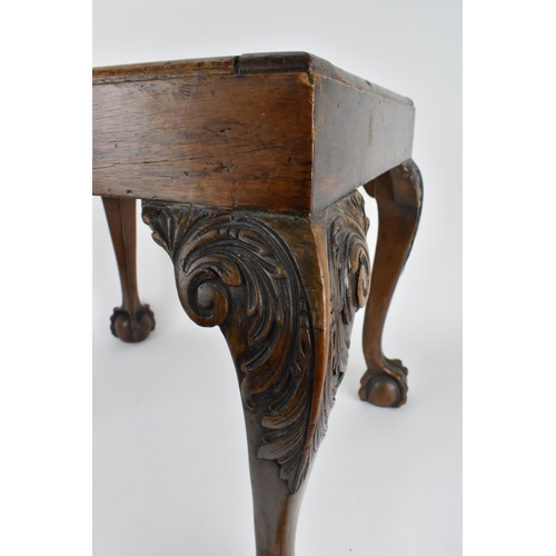 197 - A fine George II style carved walnut stool, 19th century, with drop in upholstered seat, raised on f... 