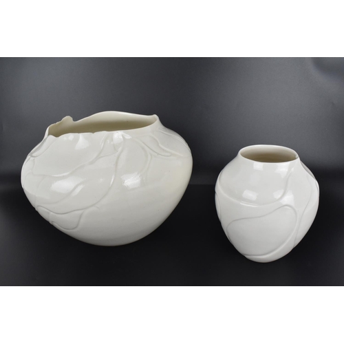 56 - A collection of 1980s porcelain pieces by Vivienne Legg, comprising two vases of bulbous form with v... 