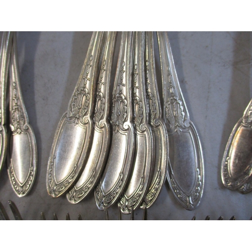 6 - A quantity of silver plated flatware stamped M & Co
Location: Porter