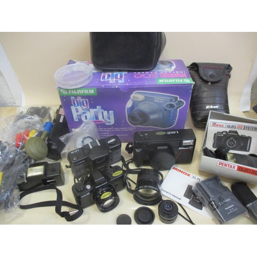 67 - Cameras to include a boxed Fiji Big Party Plus, with Instax 200 camera, a Nikon AFL35, a Zenith Lomo... 