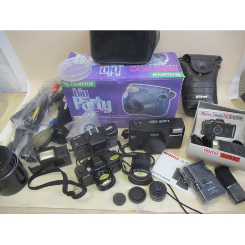 67 - Cameras to include a boxed Fiji Big Party Plus, with Instax 200 camera, a Nikon AFL35, a Zenith Lomo... 