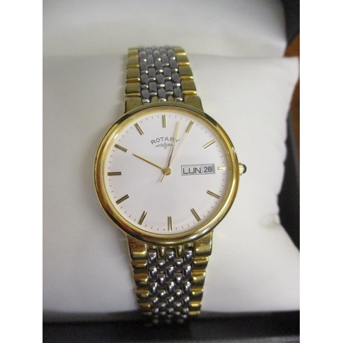 7 - A Rotary gents wristwatch in gold and silver tones together with a watch box, a Sekonda Quartz gents... 