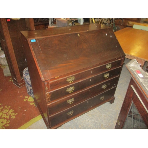 79 - A Georgian mahogany bureau, the flame mahogany fall flap with gadroon edge revealing a pigeon hole i... 