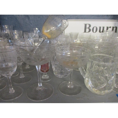 95 - A quantity of Edwardian and later drinking glasses to include etched Champagne coupes
Location: 5:2