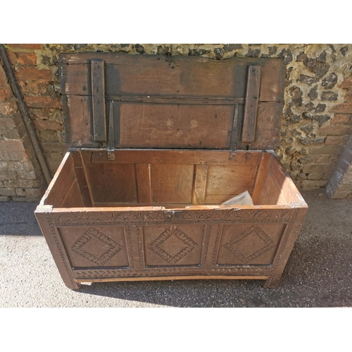 188 - A late 17th century oak coffer, with carved floral frieze above three carved lozenge panels, 64 cm h... 