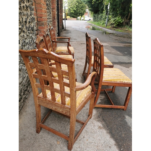 67 - A set of six mid century Heals Tilden limed oak lattice dining chairs and two armchairs, with drop i... 