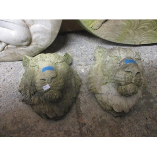 83 - A pair of composition stone garden lion masks and a pair of stone plaques
Location: G