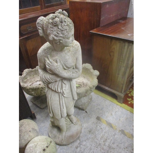 88 - A large composition stone garden statue of a woman 116cm high
Location: G