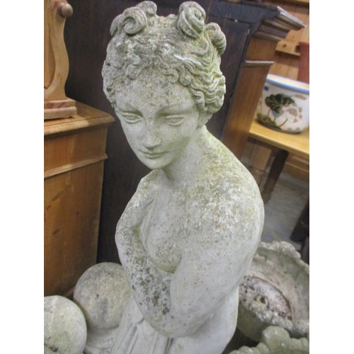 88 - A large composition stone garden statue of a woman 116cm high
Location: G