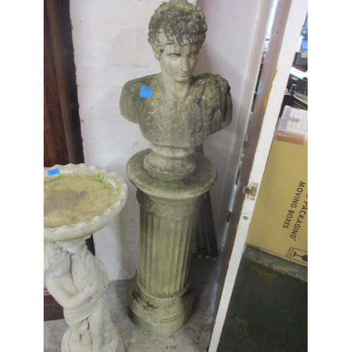 86 - A composition stone garden statue, a classical bust on a socket and plinth with leaf and fluted orna... 