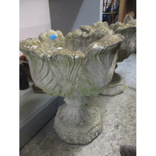 91 - A pair of composition garden urns with leaf ornament 57cm h x 50cm diameter
Location: G