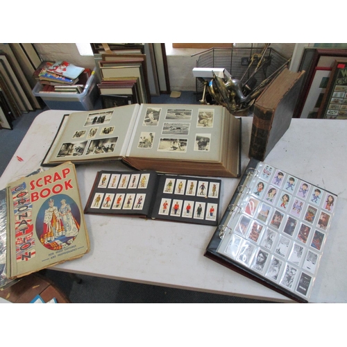 beatles cigarette cards A collection of cigarette cards to include Beatles Warus cards, together  with a large photograph alb
