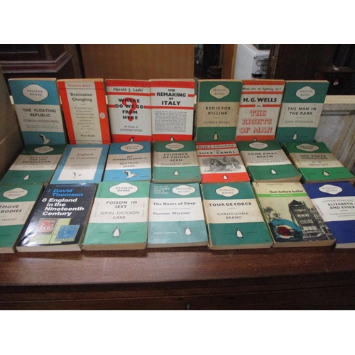 A box of various vintage Penguin and Pelican books to include