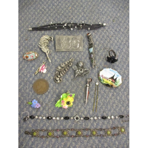 361 - A small quantity of costume jewellery to include silver items, housed in a tile topped and treen box... 