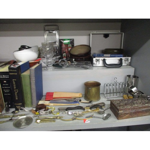 377 - A selection of kitchenalia to include a wooden handled corkscrew, and books to include a leather bou... 