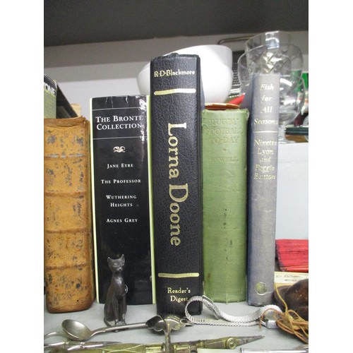 377 - A selection of kitchenalia to include a wooden handled corkscrew, and books to include a leather bou... 