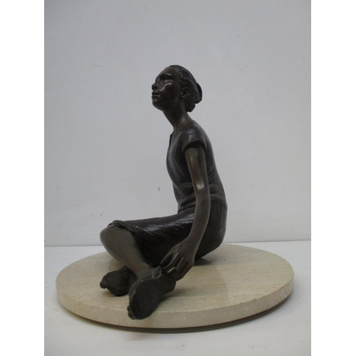 200 - Judith Holmes Drewry - 'Tuesday's Child' a bronze figure of a girl with her hair tied up, wearing a ... 