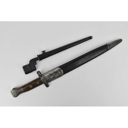 182 - A British late 19th/early 20th century MK1 Enfield bayonet, with metal mounted leather scabbard, the... 