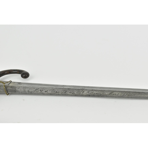 183 - A late 19th century French Third Republic Lebel Epee Bayonet with brass mounted wooden grip, three s... 