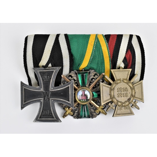 185 - A set of three medals comprising a Baden insignia for the Order of Zahringer Lion, for merit, with c... 