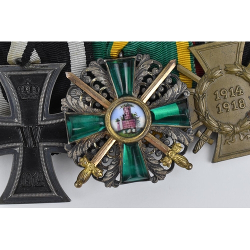 185 - A set of three medals comprising a Baden insignia for the Order of Zahringer Lion, for merit, with c... 